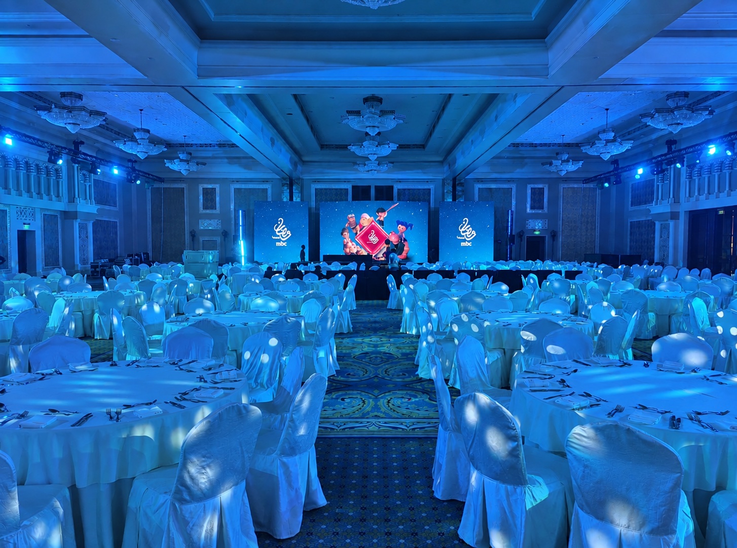 MBC Ramadan gala banquet ballroom with LED screens and mood lighting