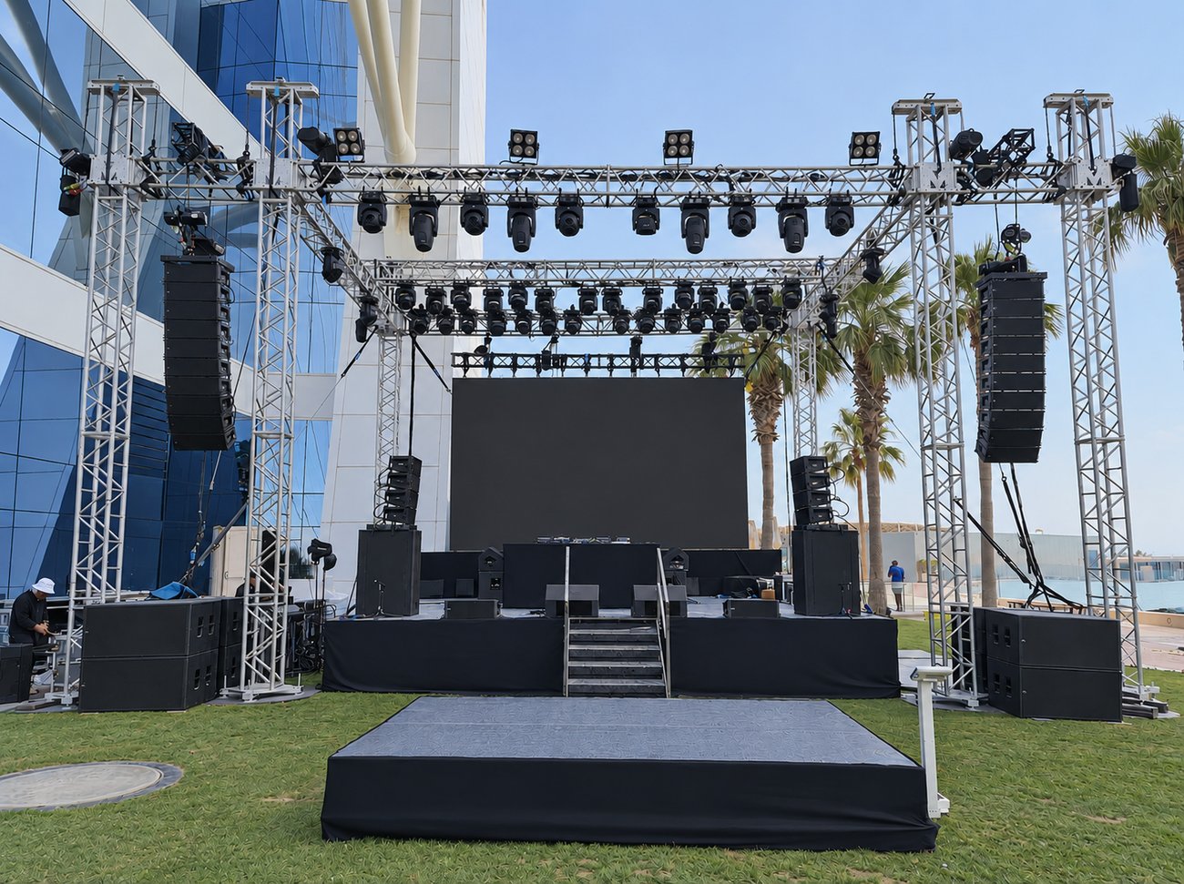 Outdoor stage and aluminium lighting truss rig with LED screen in Dubai, built by Morph